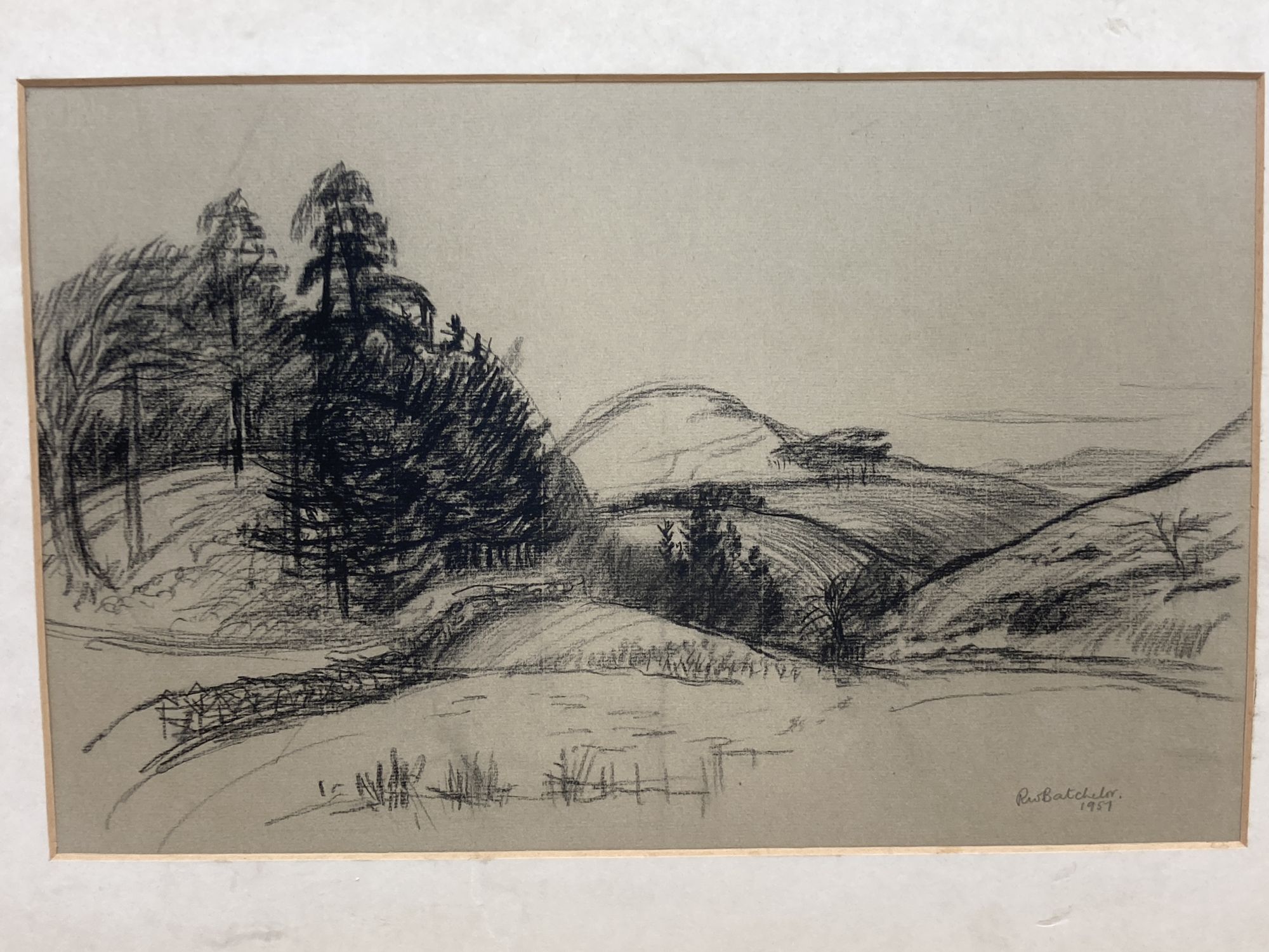 R.W. Batcheler, charcoal sketch, Mountain landscape, signed and dated 1957, 28 x 44cm and a pastel, Springtime on the windrush by A.
